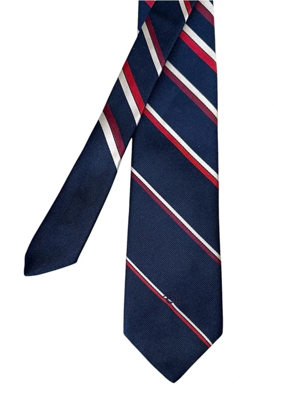 Oscar de la Renta tie gently